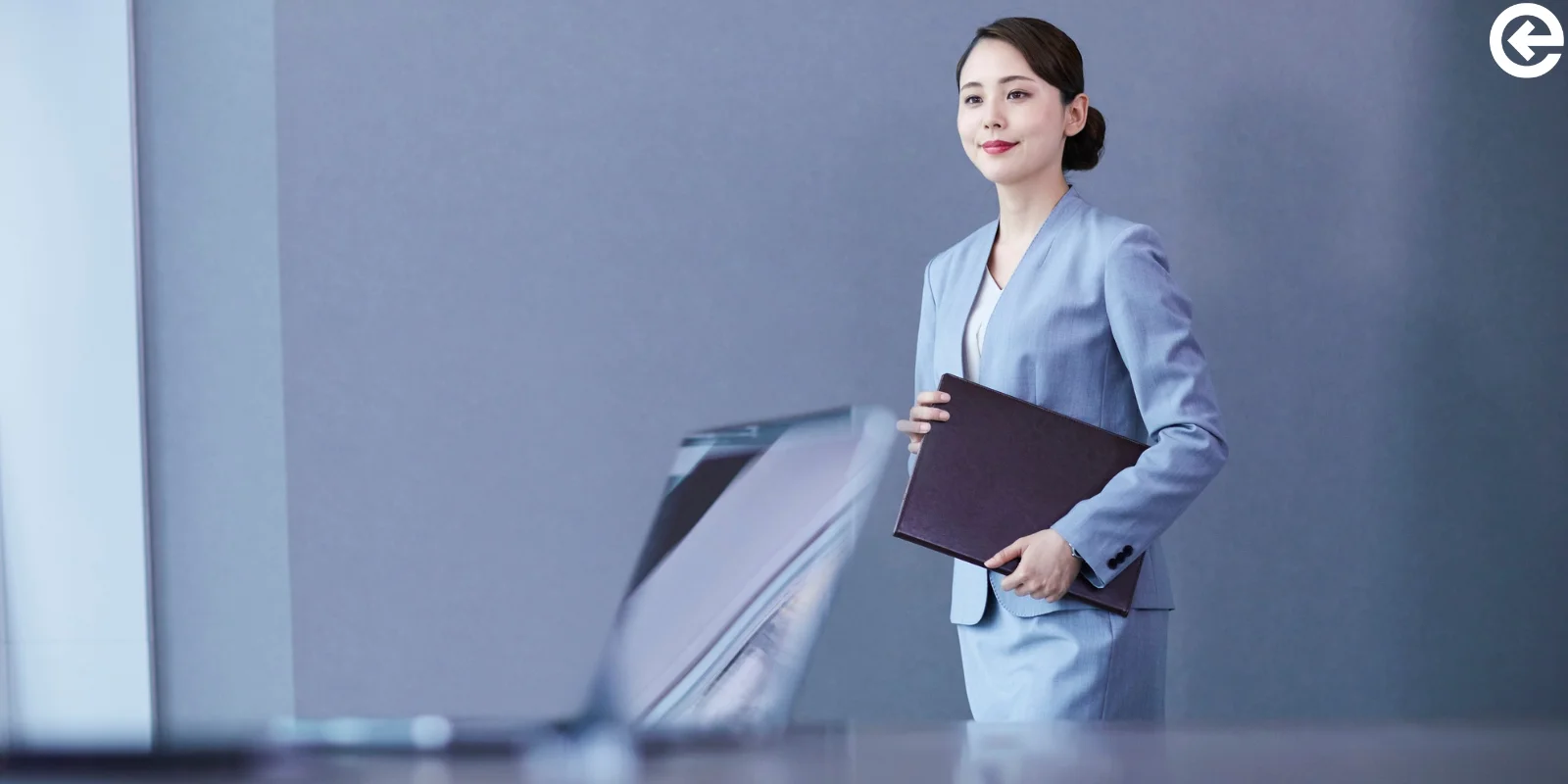 Japanese Woman Entering an Office Room